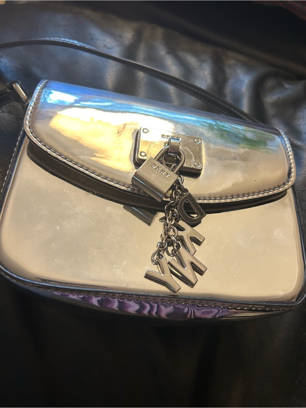 DKNY Metallic Silver Mirror Crossbody with Logo Charm
